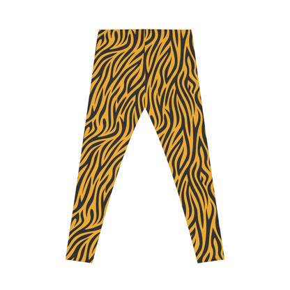 Rear view of casual leggings featuring a bold tiger stripe pattern with black wavy stripes on a vibrant orange background. The fabric has a smooth, silky texture.