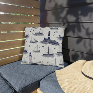 nautical outdoor pillow with sailboats and lighthouses