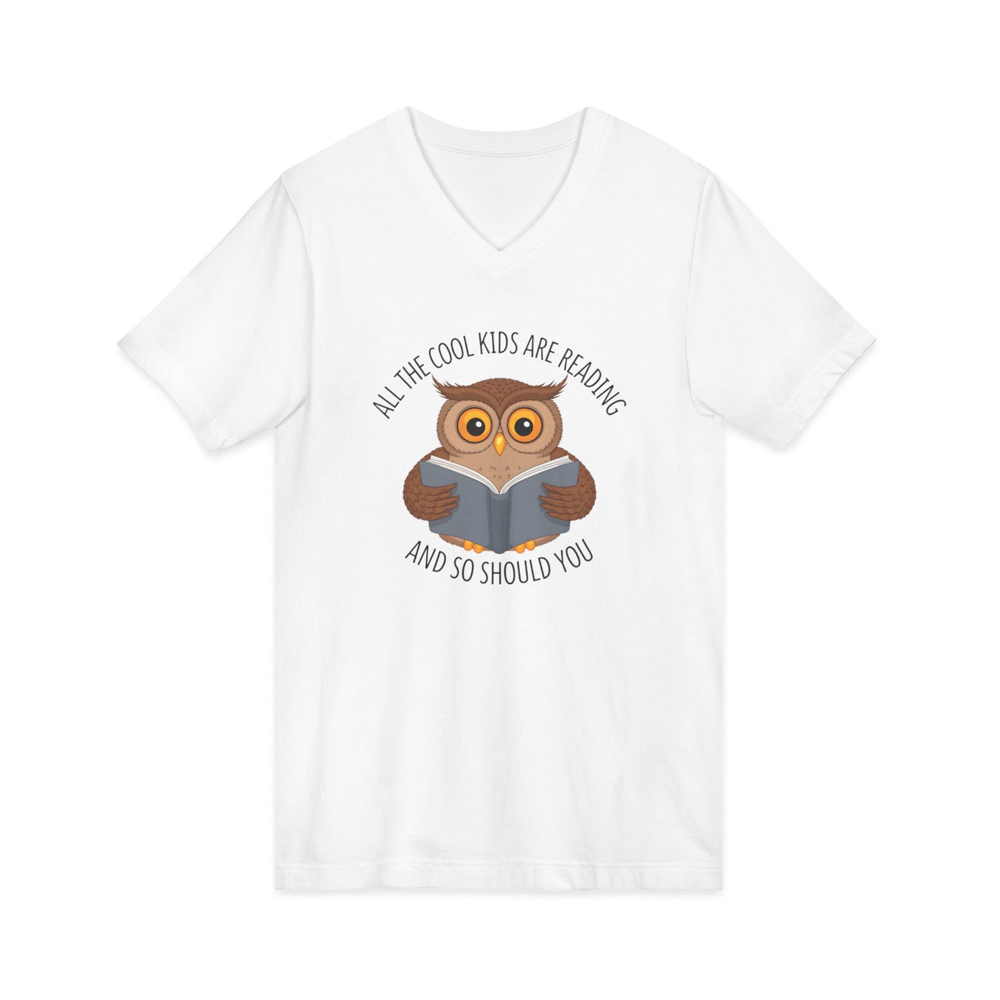 White v-neck t-shirt featuring a cartoon owl reading a book with the text All The Cool Kids Are Reading And So Should You.
